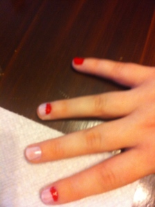 I painted my pinky finger solid red and the tops of my other nails red as well.